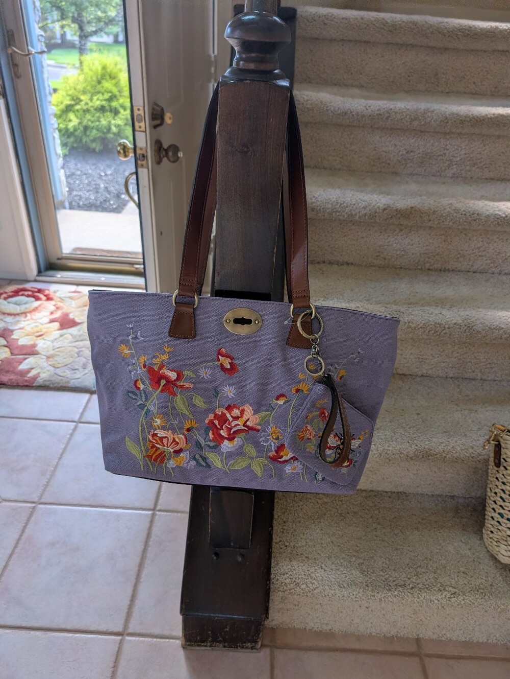 Patricia Nash tote in a cotton canvas floral motif. Lavender/Purple color.